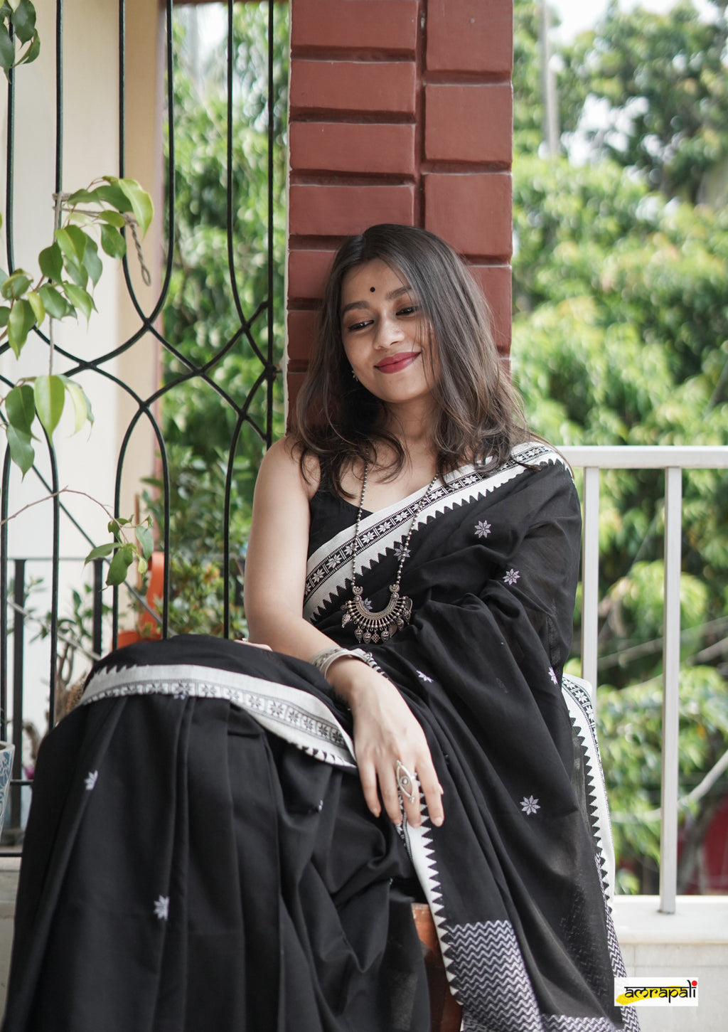 Women's Black Saree with White Traditional Border